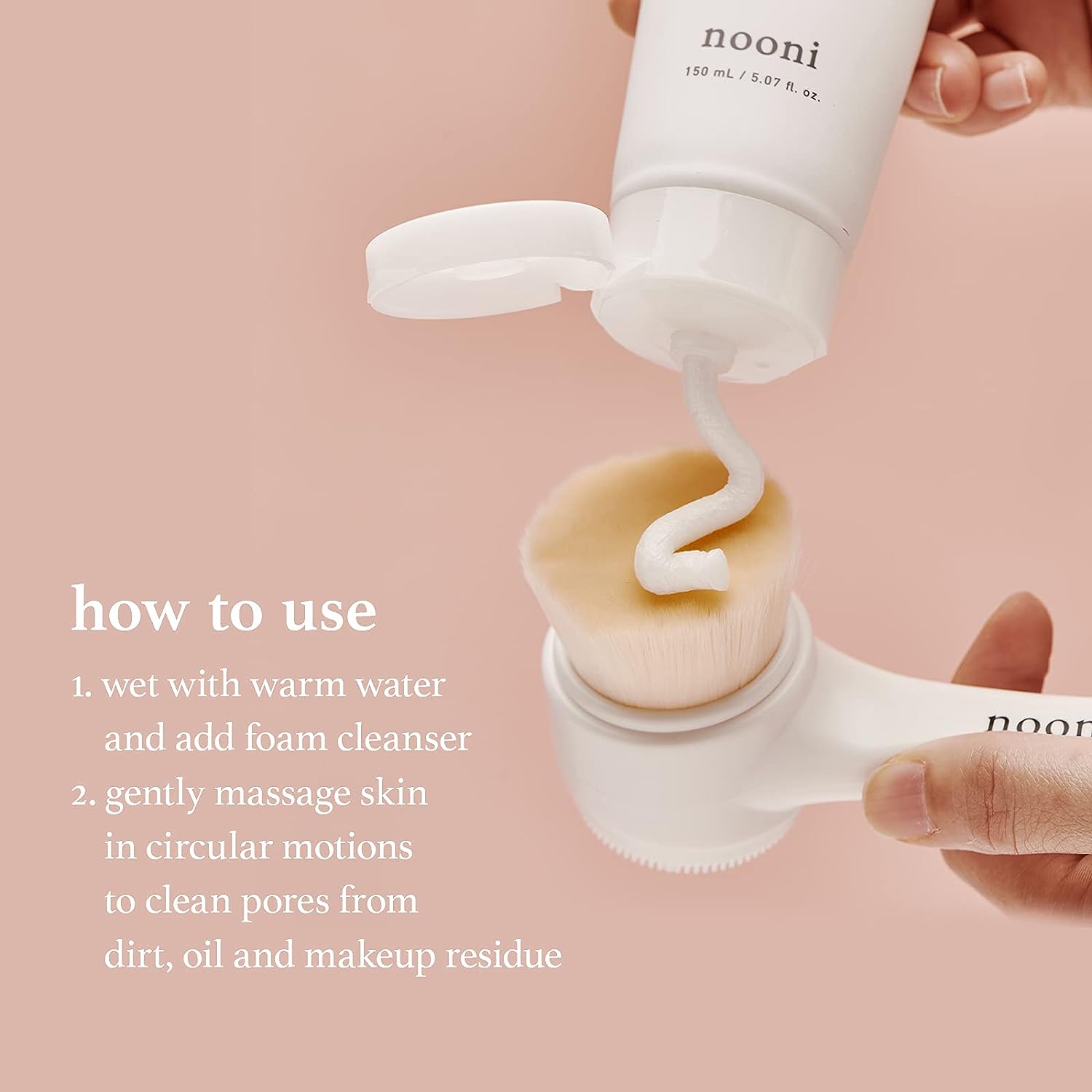 How to use Nooni dual brush: add foam cleanser and gently massage skin in circular motions