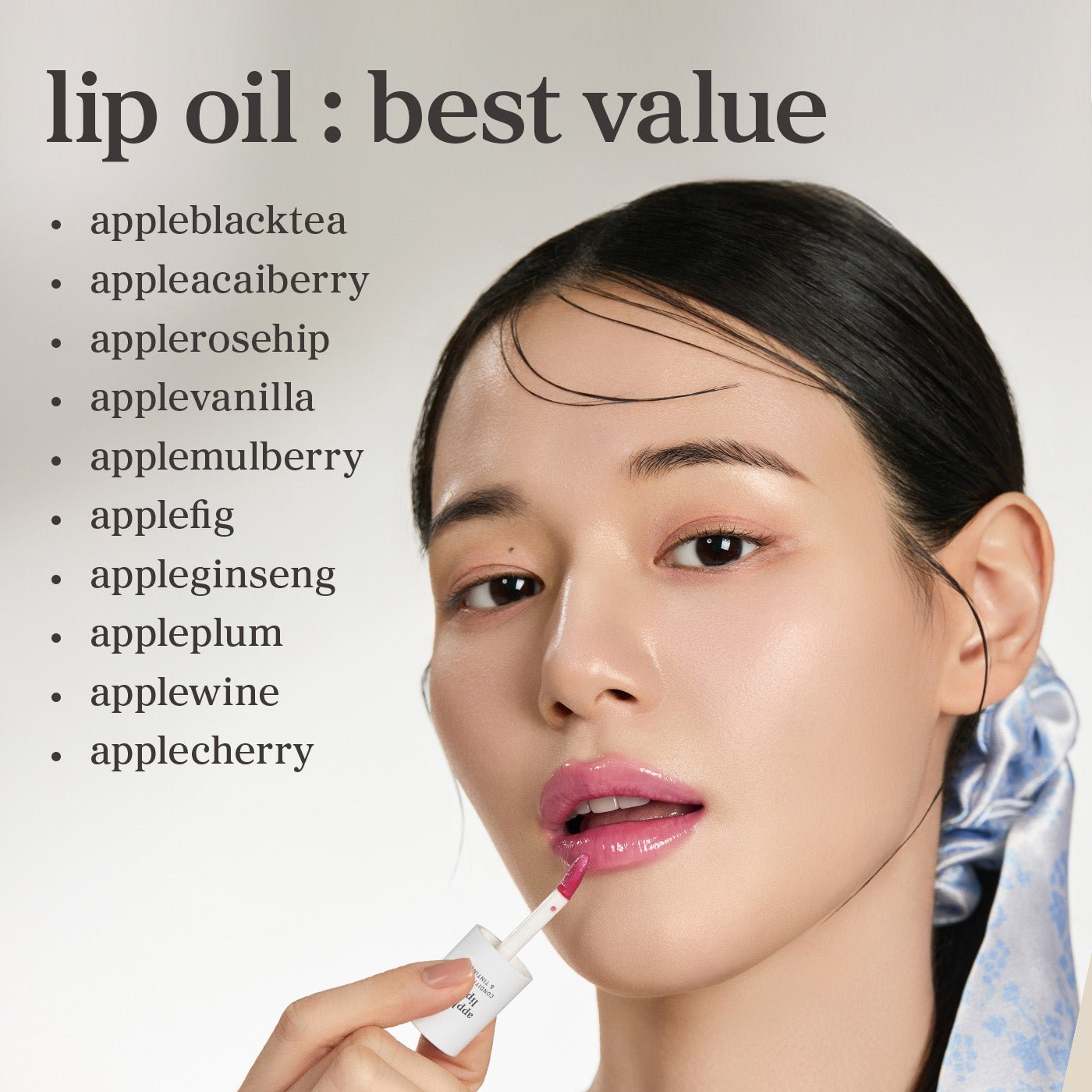 Model applying lip oil from Radiant Lip Oil Wardrobe (10 Shades) featuring best value nooni lip oil shades.
