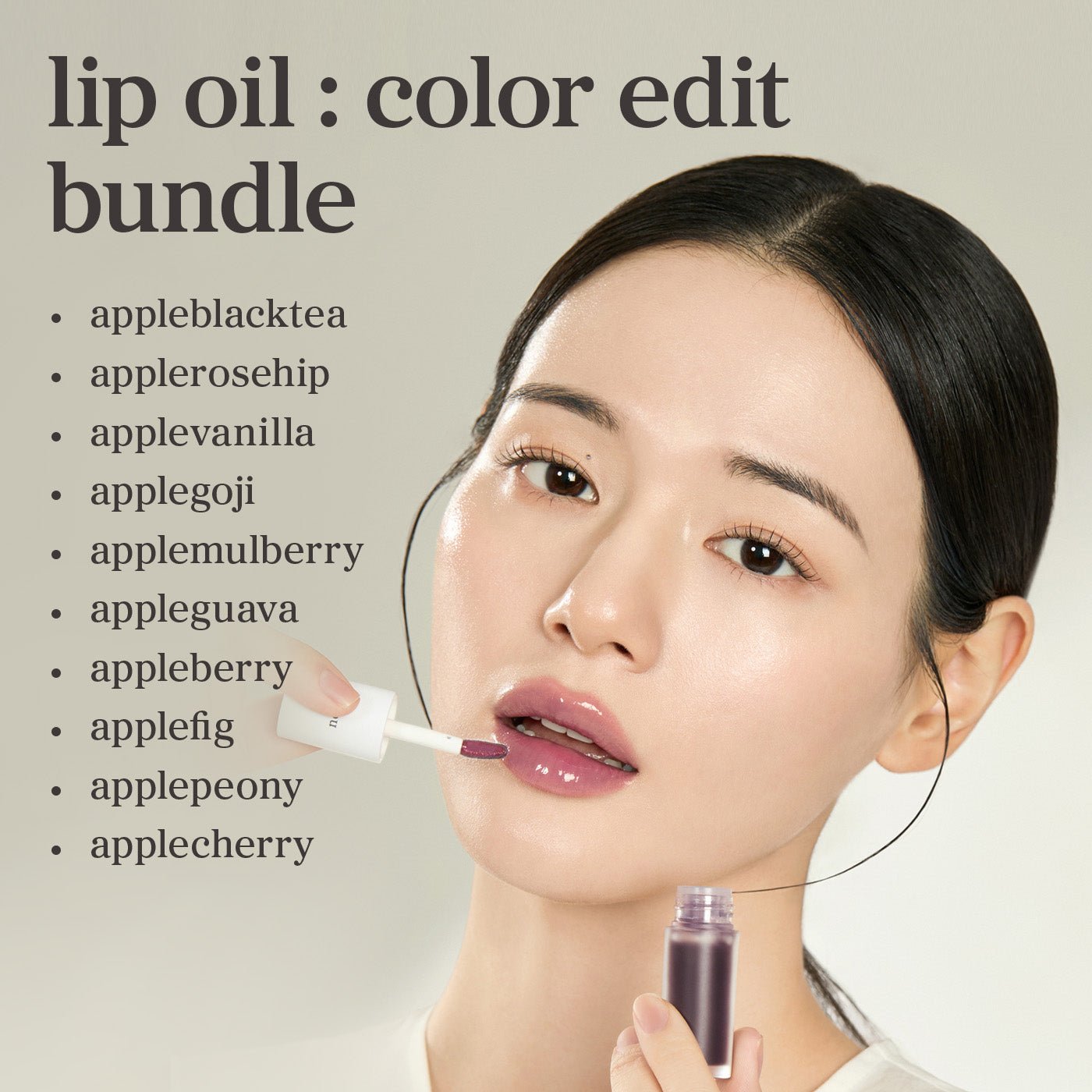 Model applying lip oil from Radiant Tinted Lip Oil Bundle (10 Pack) featuring all nooni lip oil shades.