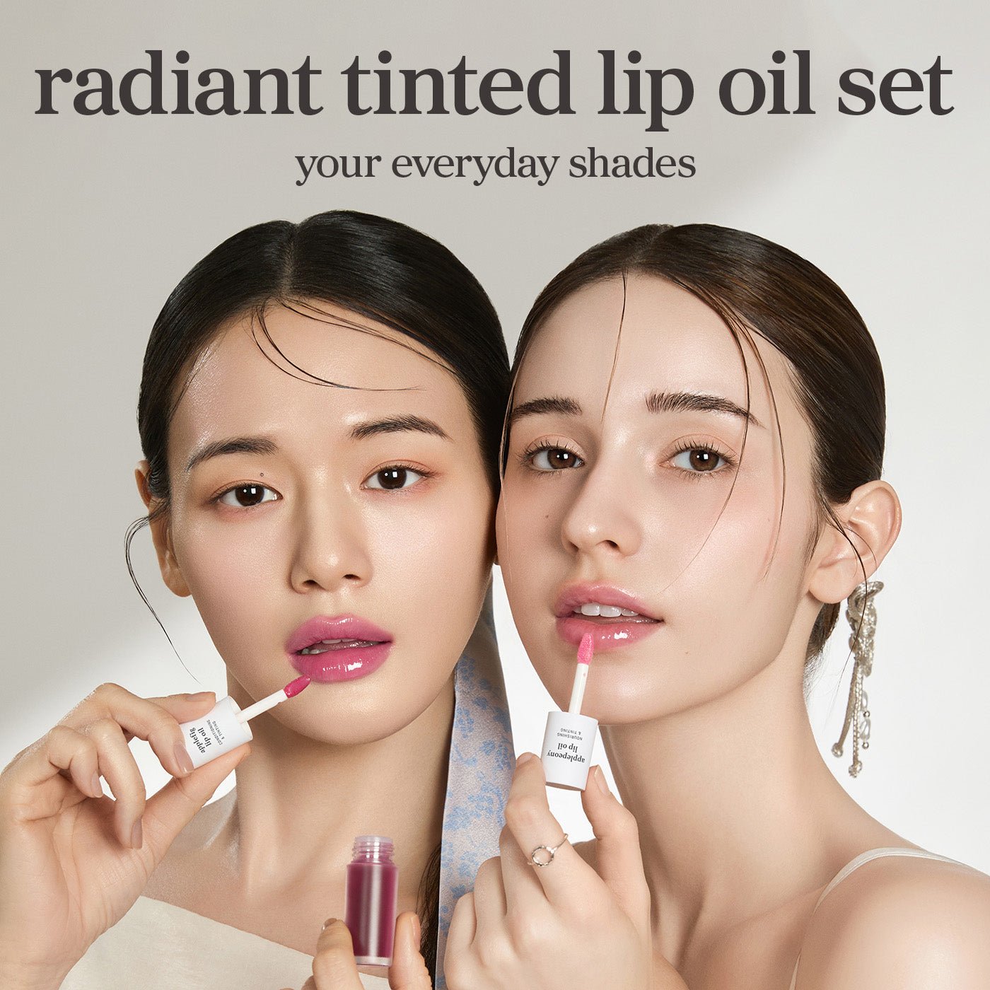 Models wearing multiple lip oil shades from nooni Radiant Tinted Lip Oil Bundle (10 pack).