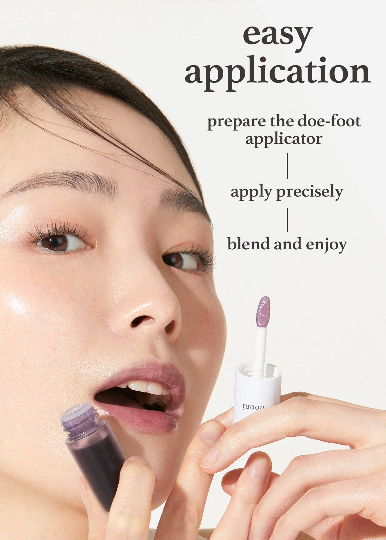 Model applying Nooni appleblacktea lip oil with applicator and easy application guide