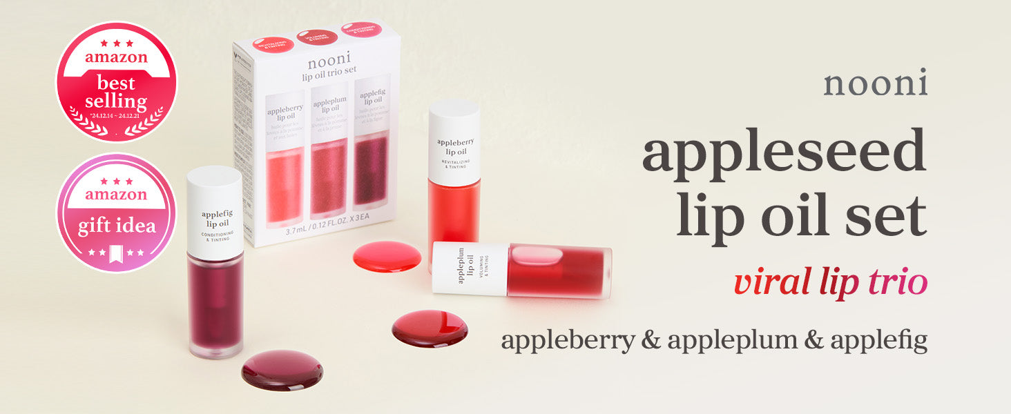 Appleseed Lip Oil Viral Trio featuring Appleberry, Appleplum, and Applefig lip oils with matching gift set packaging and shade display.