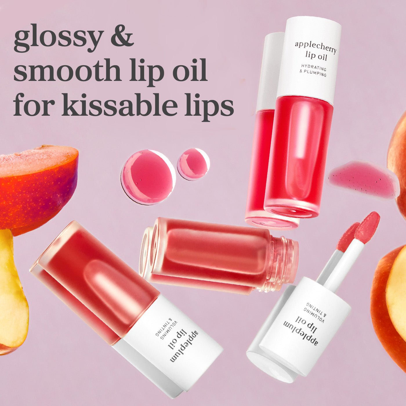 Applecherry and appleplum lip oils with fruit elements showing glossy tinted shades and smooth finish.