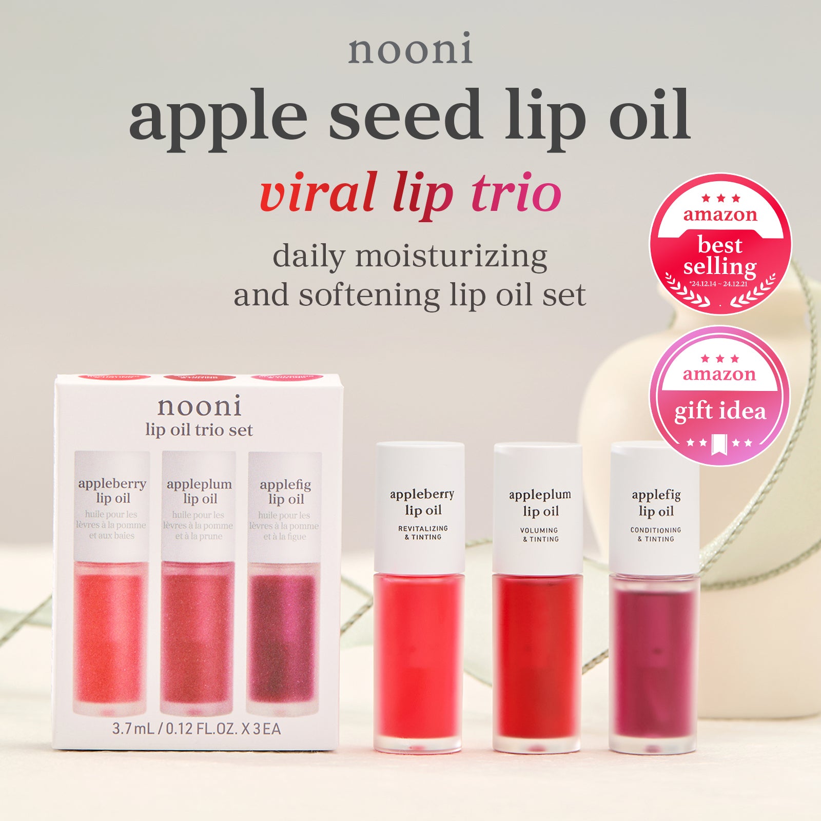 Viral lip oil trio set with Amazon best selling and gift idea badges.